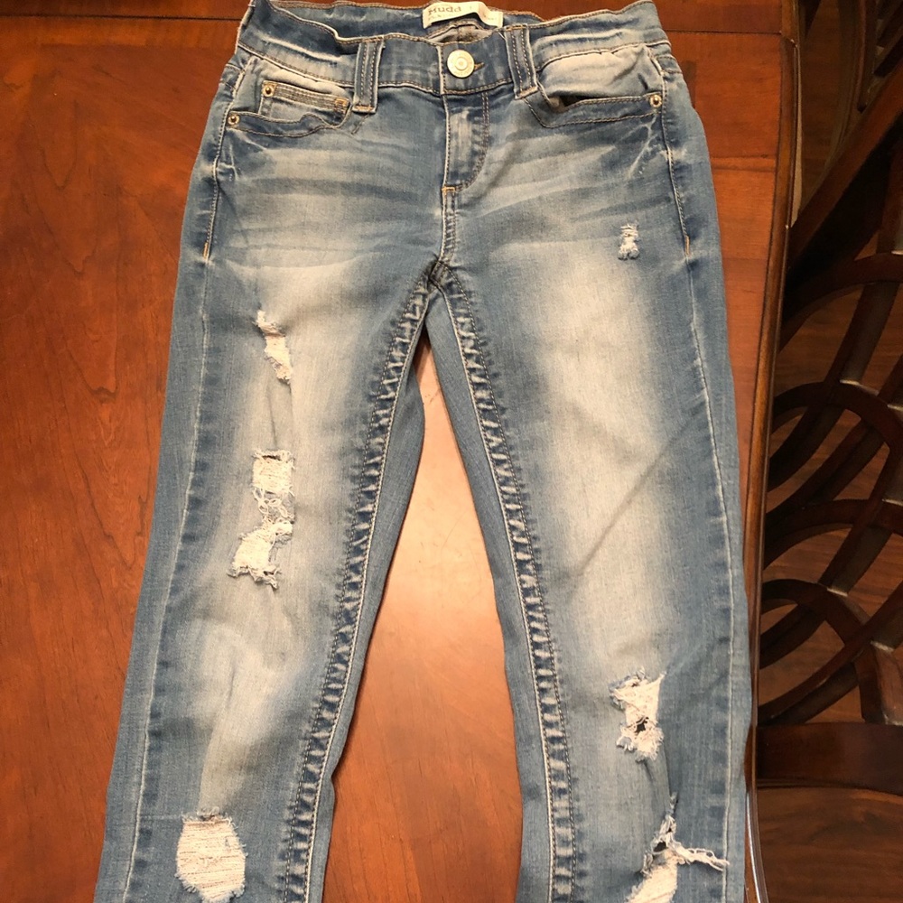 medium wash ripped jeans; size 1